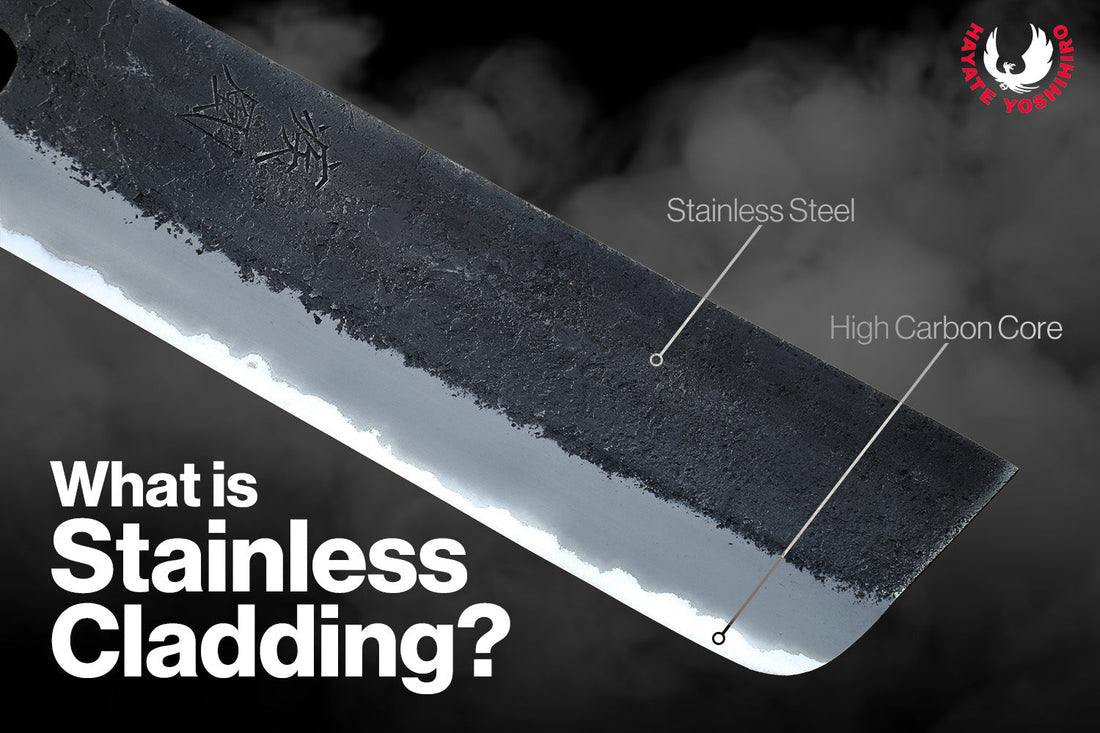 Close-up of a stainless-clad Japanese kitchen knife blade showing the layered construction