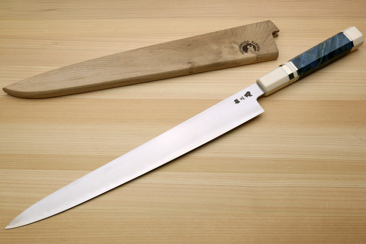 Sujihiki slicer knife with blue stabilized handle and light wood saya, side view