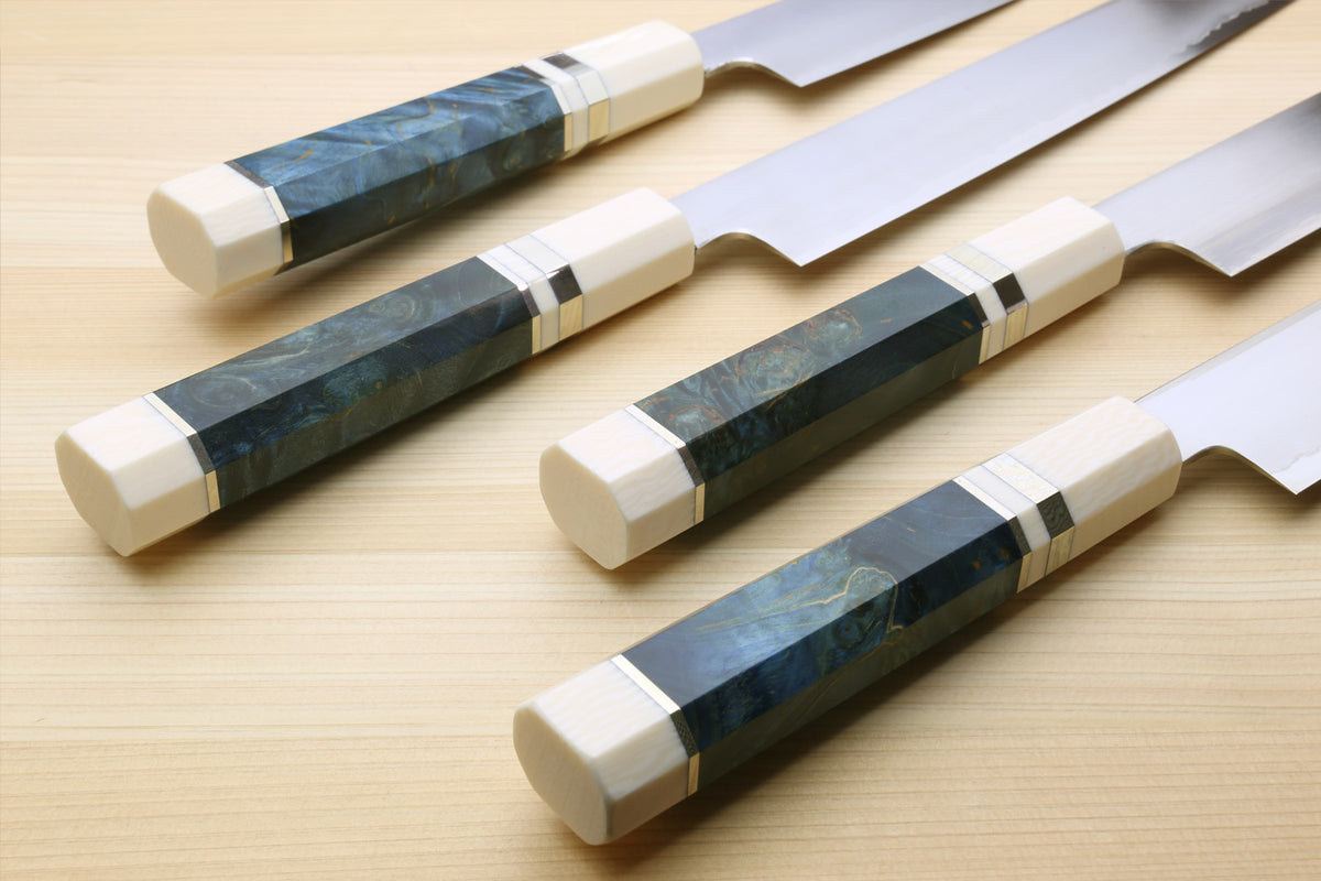 Set of sujihiki slicer knives with blue stabilized handles and white spacers