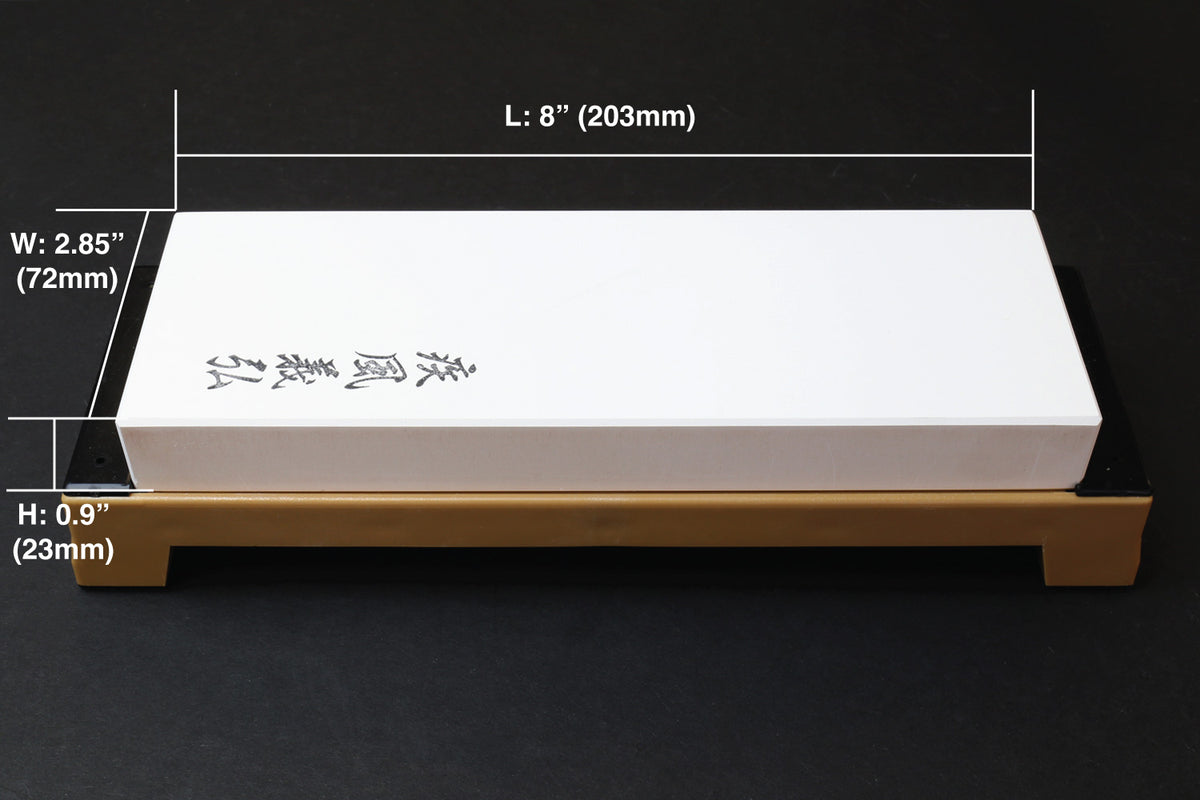 8000-grit sharpening whetstone with white stone on tan base, 203mm long