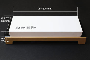 8000-grit sharpening whetstone with white stone on tan base, 203mm long