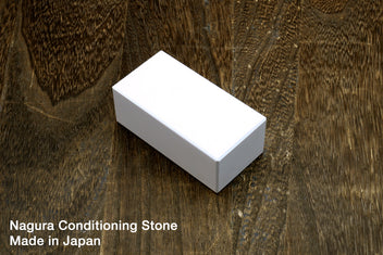 Nagura conditioning stone, small white rectangular stone for sharpening setup