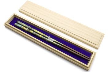 Wooden chopstick box with pair of lacquered chopsticks and purple insert