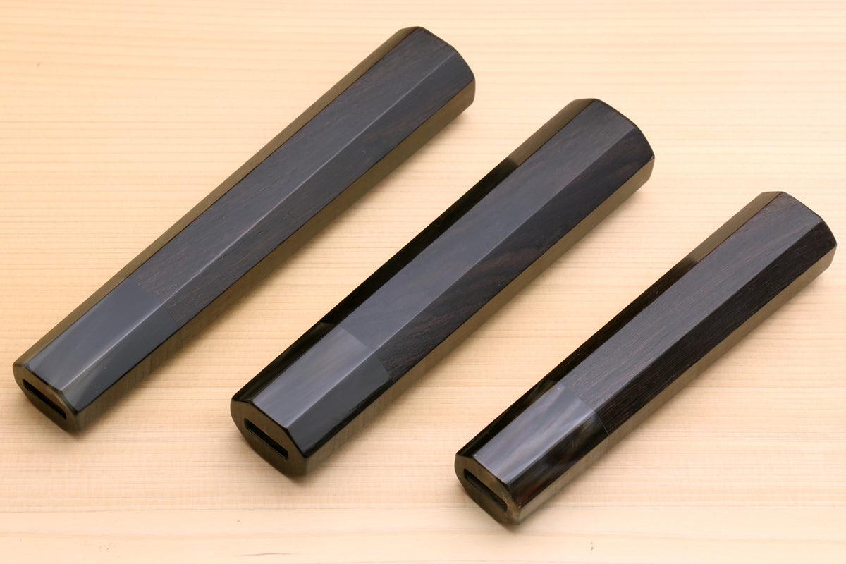 Four ebony knife handle blanks with dark horn bolsters, top view, for Sujihiki knives