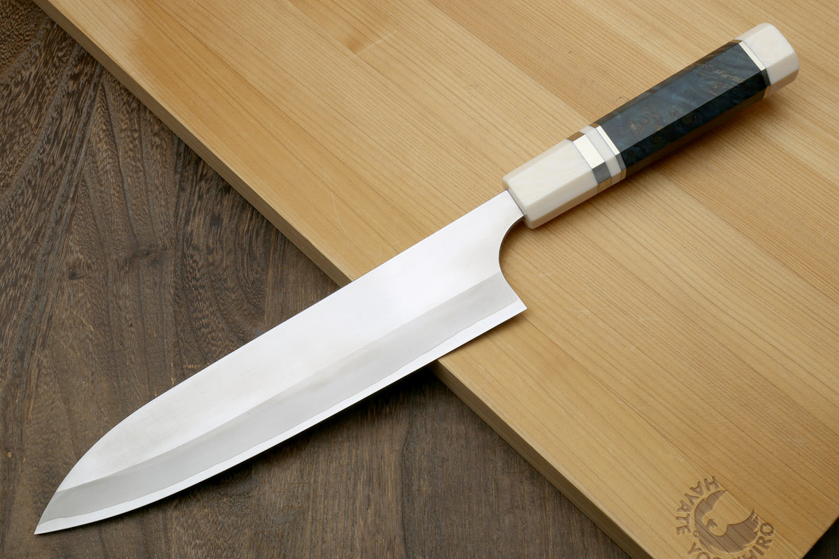 Gyuto chef's knife with white bolster and octagonal blue handle, HAP40 blade