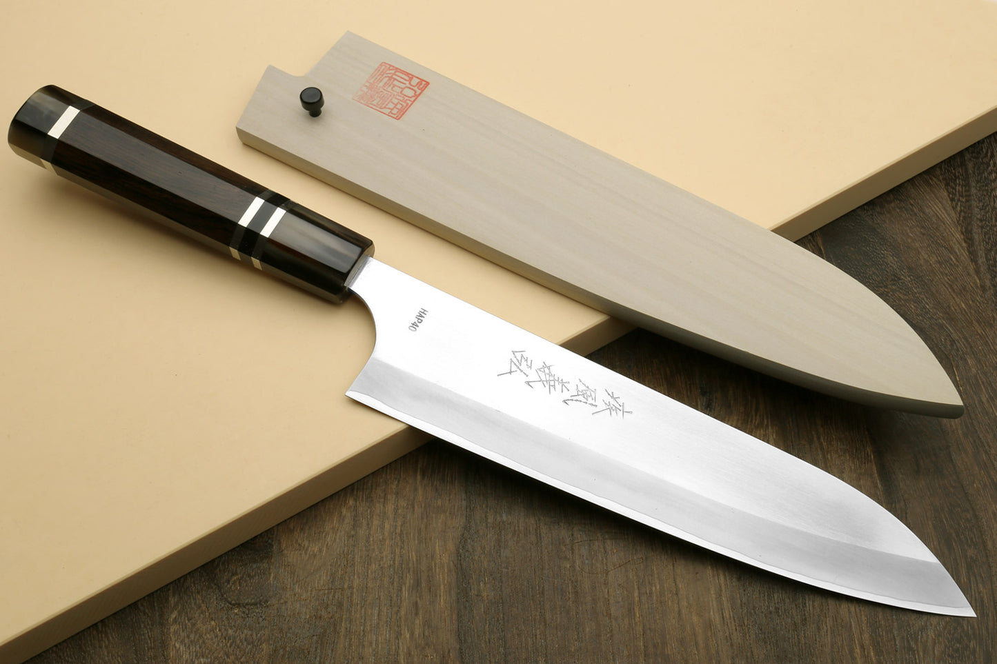 Yoshihiro High Speed Steel HAP40 Gyuto Chefs Knife with Triple Ring Ebony Handle with Magnolia Saya Cover