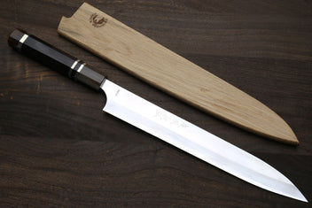 Sujihiki slicer knife with silver blade, dark ebony triple-ring handle, wooden saya cover
