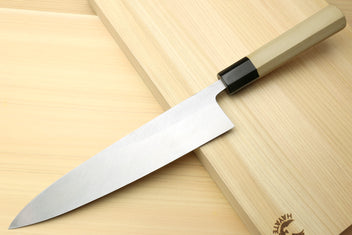 Japanese chef knife for sushi and sashimi, silver blade with black bolster and light wood handle
