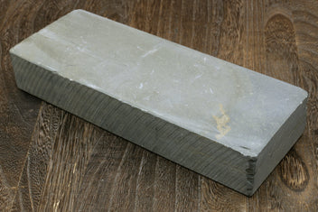 Rectangular natural whetstone block, pale white top, beveled edges