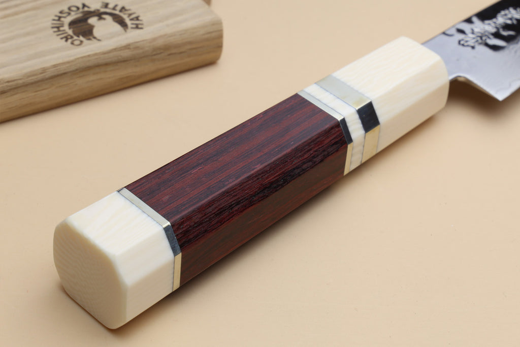 Damascus petty knife handle end with ivory bolster and rosewood center spine