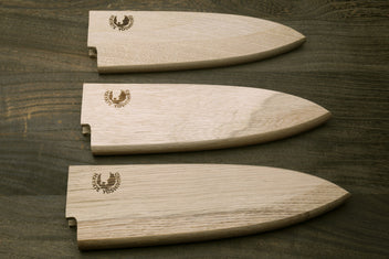 Set of three oak saya blade protectors for deba knives, varying fit openings