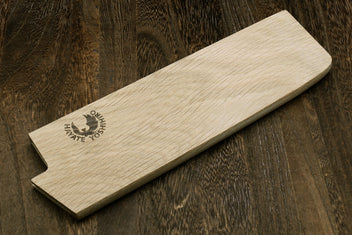 Oak wood saya blade cover with notch cutout and embossed logo, laid flat
