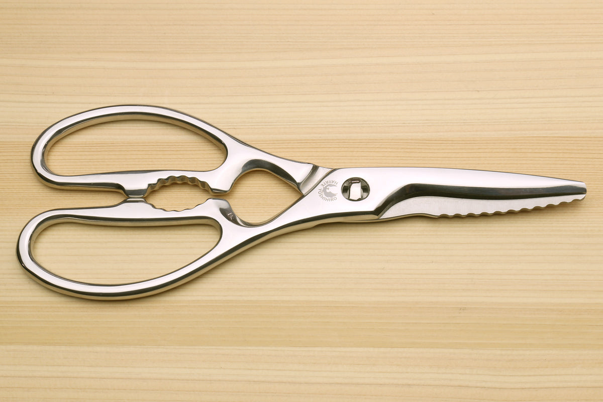 Stainless steel Japanese kitchen shears, serrated cutting edges and loop handles.