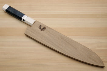 Damascus gyuto chef knife with ocean blue handle, ivory bolster, on wooden stand