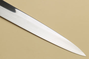 Mirror-polished yanagi sashimi knife blade with pointed tip and smooth edge