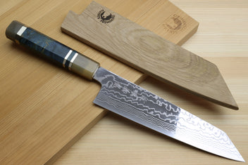 Damascus kiritsuke chefs knife with ocean blue handle and sharp pointed blade
