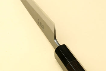 Yoshihiro Kurouchi petty utility knife close-up of blade tip and dark handle