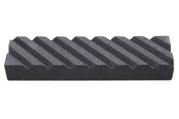 Black stone fixer block with ridged surface for sharpening and conditioning tools