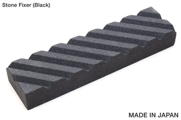 Sharpening stone fixer, black ribbed stone holder with parallel grooves
