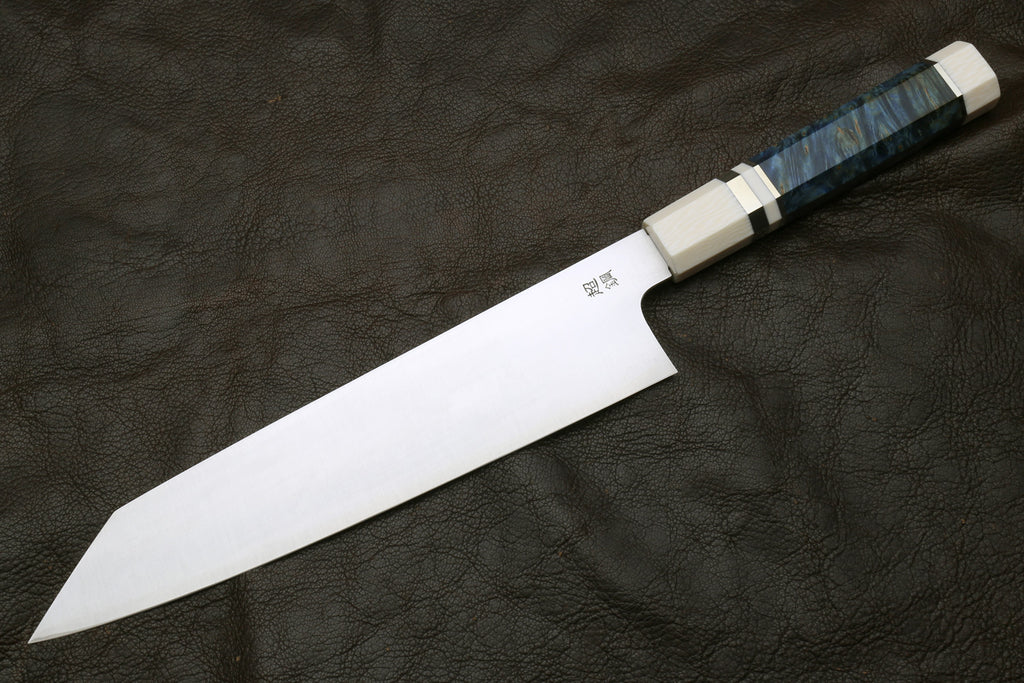 Knife with a blue handle on a dark textured background