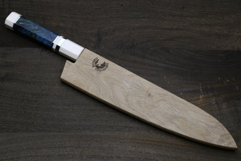 Gyuto chef knife with ocean blue handle, ivory bolster, and stamped stainless blade