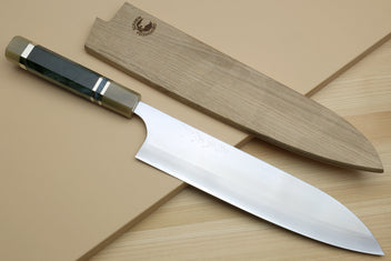 Gyuto chef's knife with polished blade and dark blue handle with metal rings