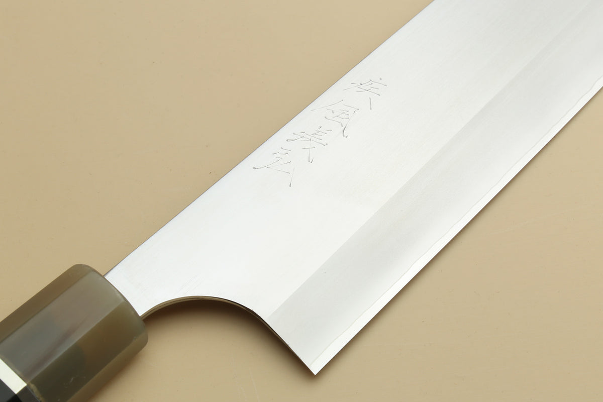 Yoshihiro Hayate knife close-up of polished blade and curved heel