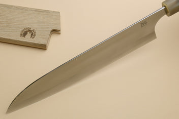 Gyuto chef's knife with long polished blade and blue triple-ring handle