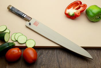 Hayate Hinoura kurouchi sujihiki slicer knife, blue steel clad blade and wood-toned handle