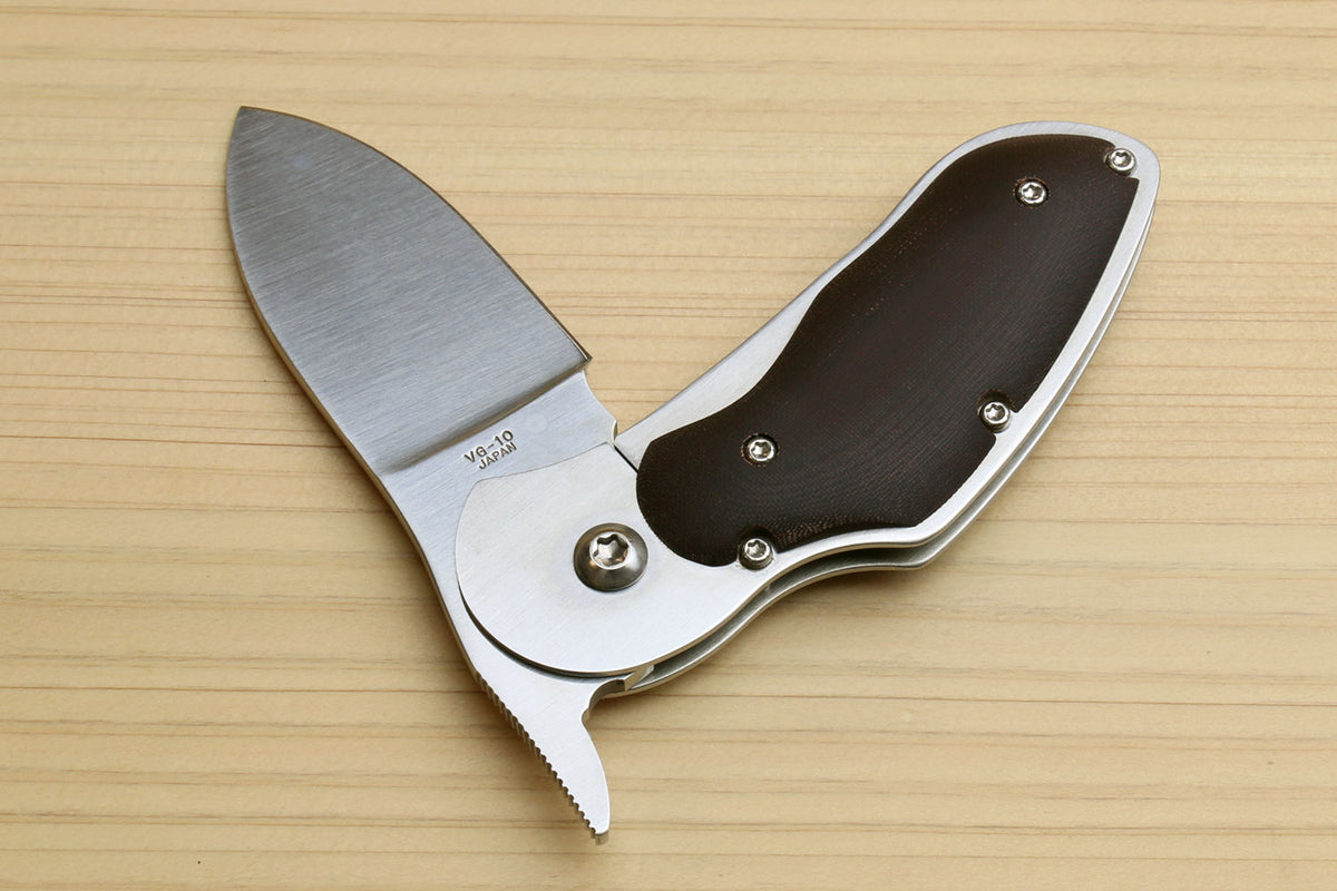 Folding pocket knife with open stainless blade and dark brown handle, metal pins