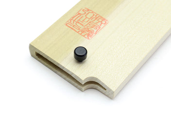 Wooden saya cover with black safety pin inserted