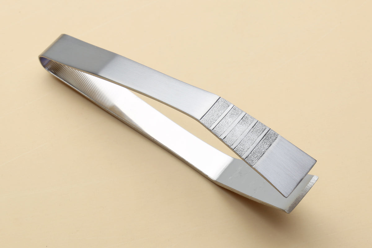 Non-slip fish bone tweezers with textured center grip and stainless steel finish.