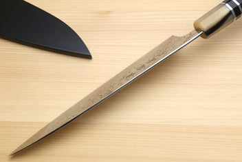 Damascus gyuto chef knife with octagonal dark handle and triple ring