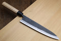 Kurouchi blue steel gyuto knife with light Kaede handle and black collar