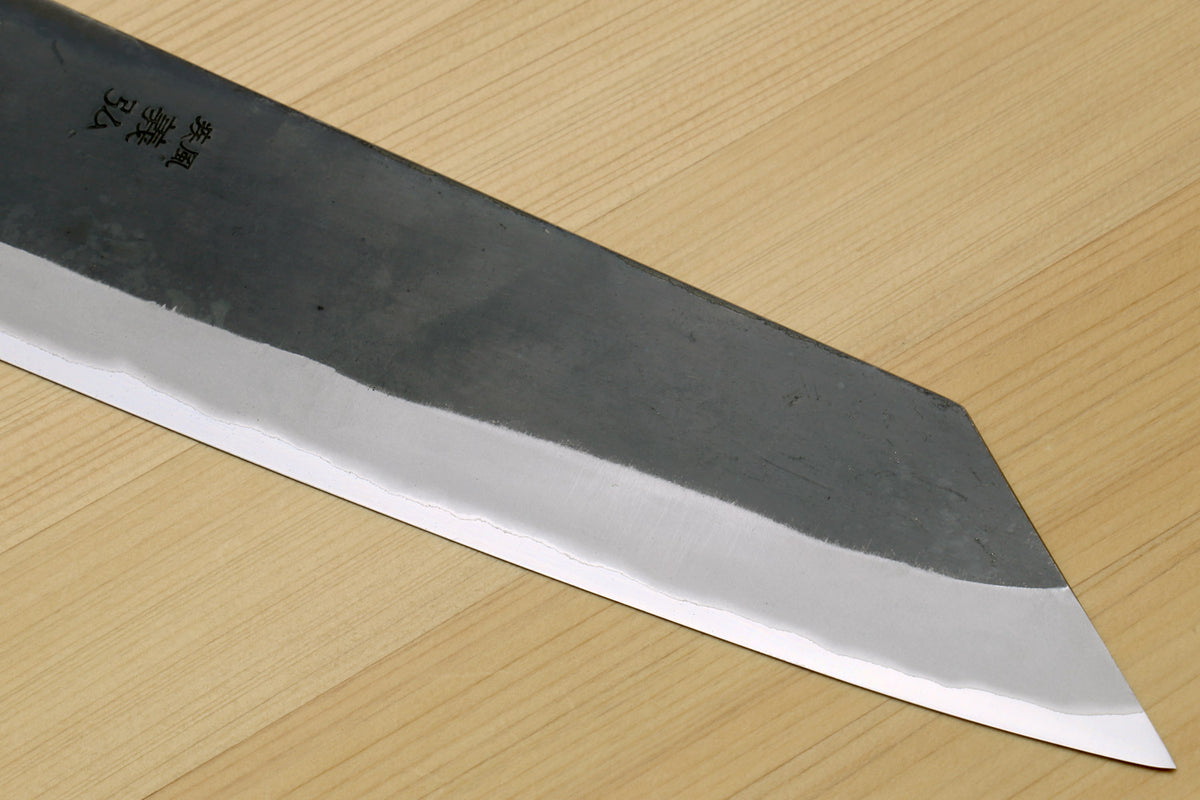 Kiritsuke chef knife blade side, dark blue steel with sharp pointed tip