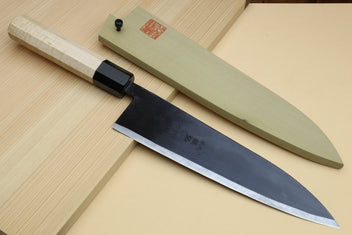 Gyuto chef knife with matching light sheath, pale camphor handle, dark blade