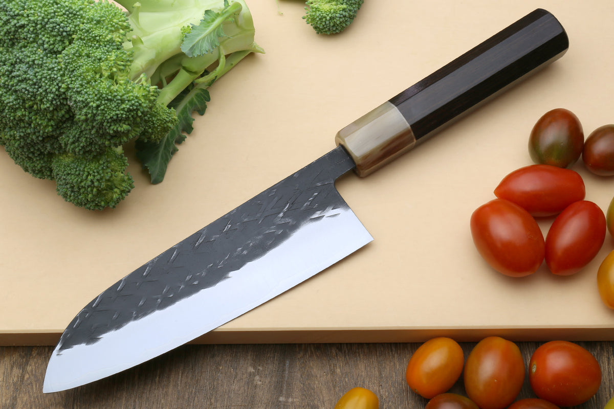 Santoku knife with hammered stainless blade and dark wood handle