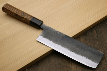Japanese nakiri vegetable knife with dark cocobolo handle and silver steel blade edge
