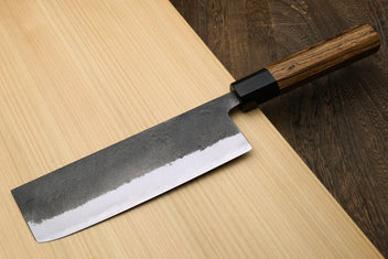 Japanese nakiri vegetable knife with cocobolo handle and wide steel blade with textured finish