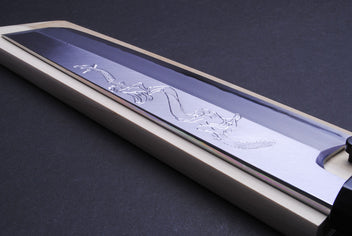 Japanese eel bone slicer knife, angled view showing engraved blade and spine.