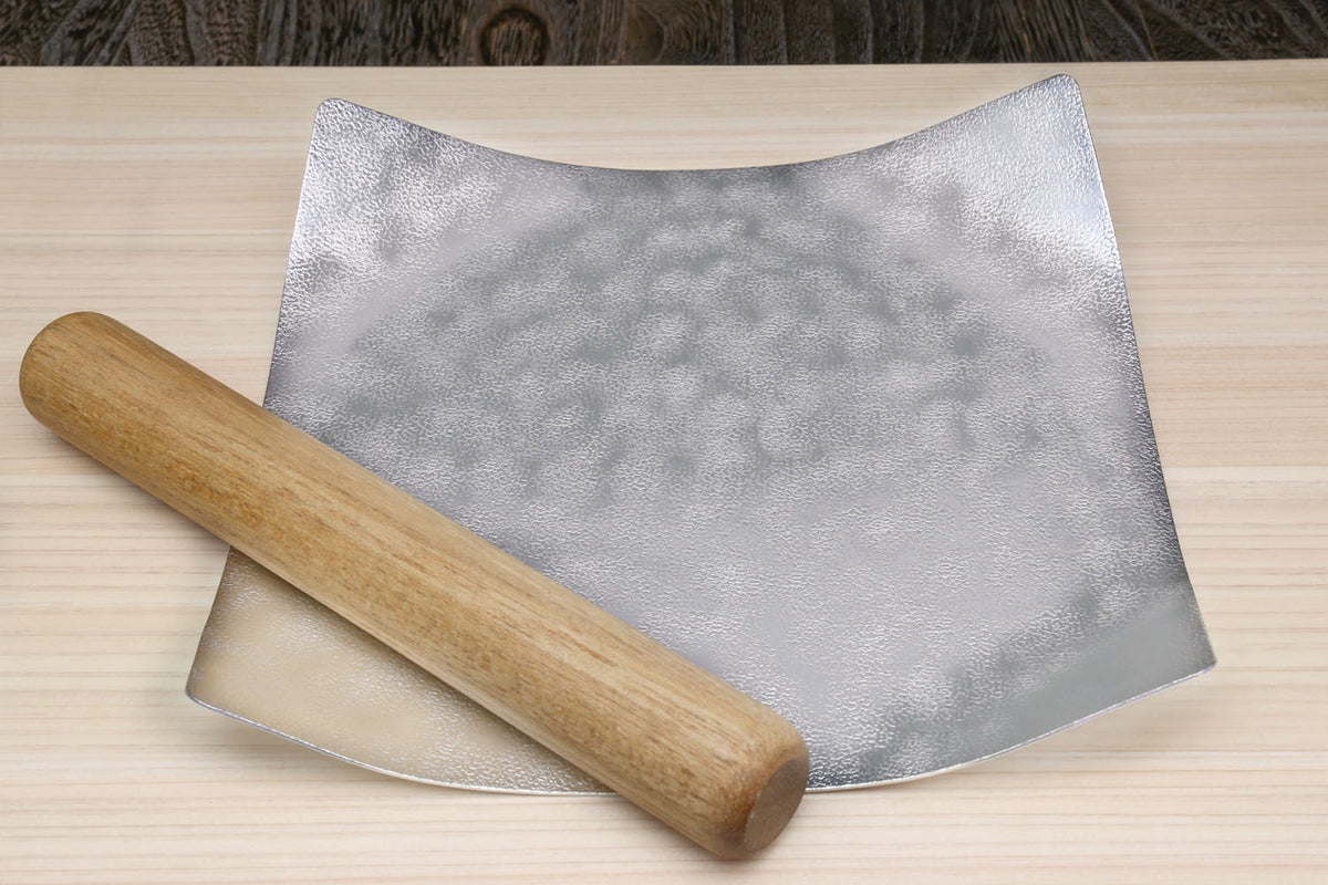 Silver hammered flexible tin plate with wooden rolling stick