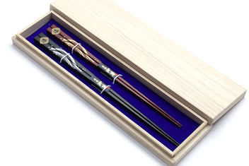 Chopsticks set in light wooden box with blue insert lining