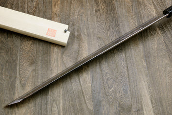 Yanagi-kiritsuke tuna knife with long mirror-polished steel blade and light wooden saya