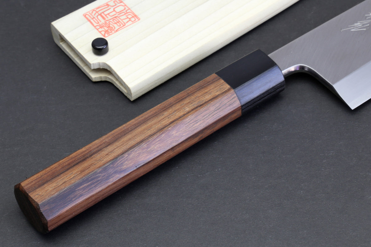 Japanese filet knife with blue-brown wood handle and pale blade on side