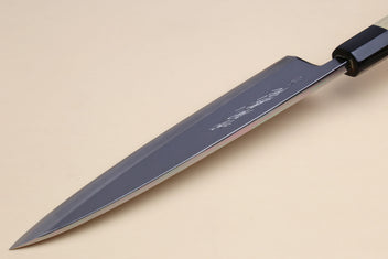 Japanese sashimi knife with dark blue blade and black handle collar