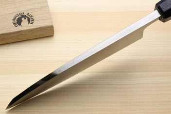 Japanese deba knife angled view with stainless blade and dark blue handle