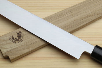Yoshihiro Kasumi yanagi sashimi knife with long white blade and black magnolia handle