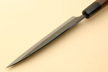Kurouchi petty knife with long pointed blade and dark shitan handle