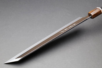 Kiritsuke knife with mirror-finished blade and warm brown handle with silver ring