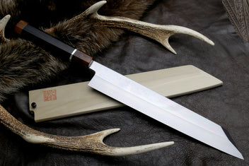 Japanese kiritsuke knife with mirror-finished silver blade and dark wood handle